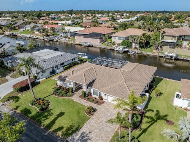 314 Oakwood Cir, Englewood, FL 34223 - drone / aerial view with a water view and a residential view