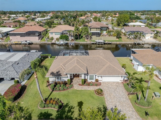 314 Oakwood Cir, Englewood, FL 34223 - bird's eye view featuring a water view and a residential view