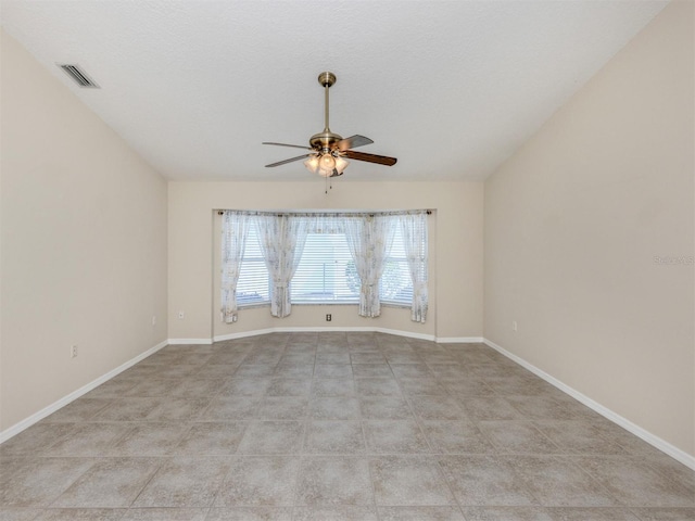 314 Oakwood Cir, Englewood, FL 34223 - unfurnished room featuring ceiling fan, lofted ceiling, baseboards, and visible vents