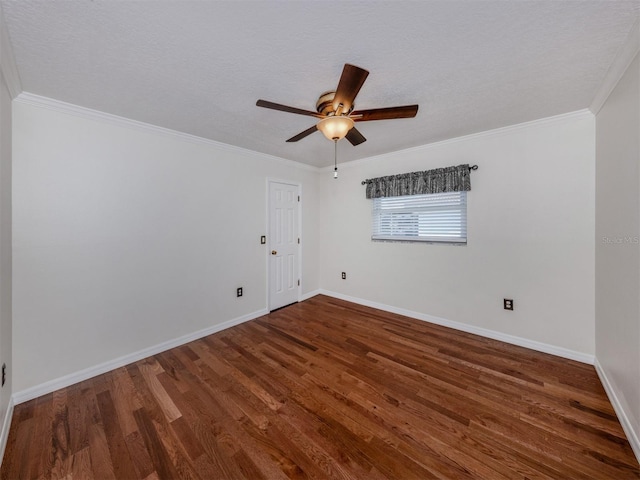 314 Oakwood Cir, Englewood, FL 34223 - spare room featuring ornamental molding, baseboards, a ceiling fan, and wood finished floors