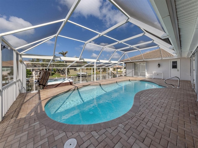 314 Oakwood Cir, Englewood, FL 34223 - outdoor pool featuring a patio and a lanai