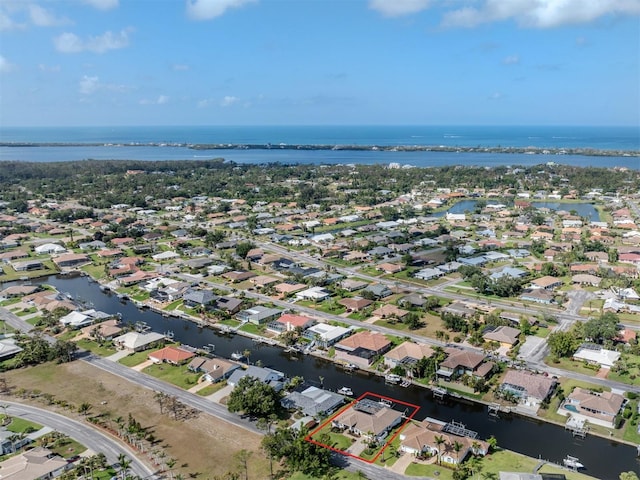 314 Oakwood Cir, Englewood, FL 34223 - bird's eye view featuring a water view and a residential view