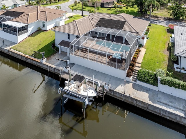 314 Oakwood Cir, Englewood, FL 34223 - bird's eye view featuring a water view and a residential view