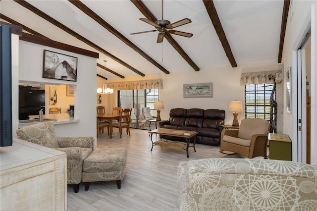 5559 Brassy Loop, North Port, FL 34287 - living area with wood finished floors, ceiling fan, and a chandelier