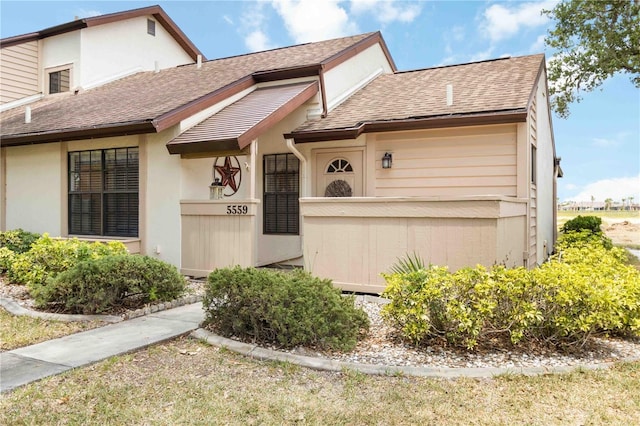 5559 Brassy Loop, North Port, FL 34287 - view of front of home featuring roof with shingles