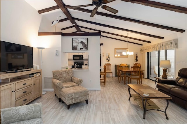 5559 Brassy Loop, North Port, FL 34287 - living area with ceiling fan, a chandelier, light wood-style flooring, and baseboards