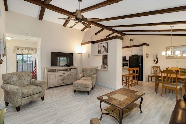 5559 Brassy Loop, North Port, FL 34287 - living area with ceiling fan, a chandelier, light wood-style floors, and baseboards