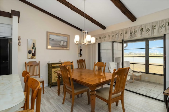 5559 Brassy Loop, North Port, FL 34287 - dining space with a chandelier, light wood-type flooring, and a water view