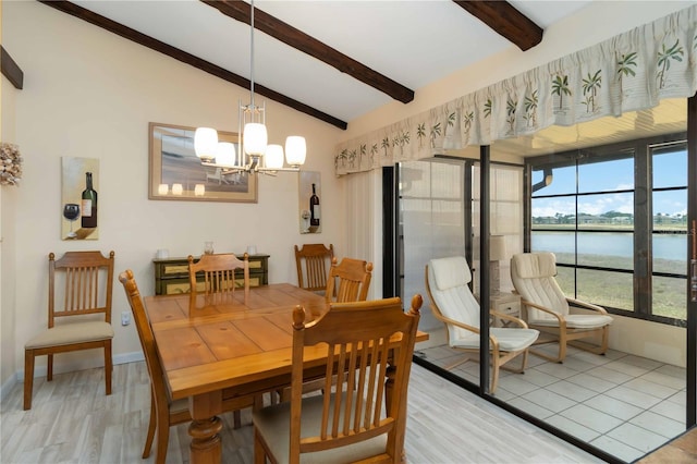 5559 Brassy Loop, North Port, FL 34287 - dining area featuring a chandelier, a water view, and light wood-style flooring