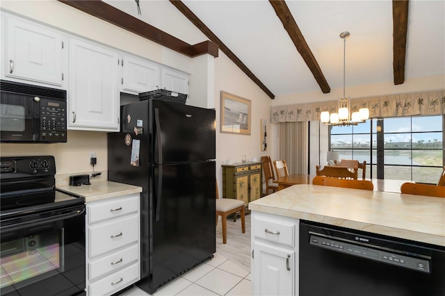 5559 Brassy Loop, North Port, FL 34287 - kitchen with black appliances, a chandelier, light countertops, white cabinetry, and hanging light fixtures