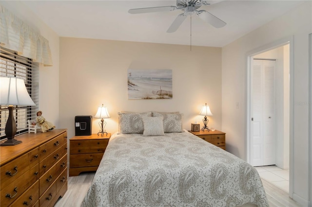 5559 Brassy Loop, North Port, FL 34287 - bedroom with light wood-style floors and ceiling fan