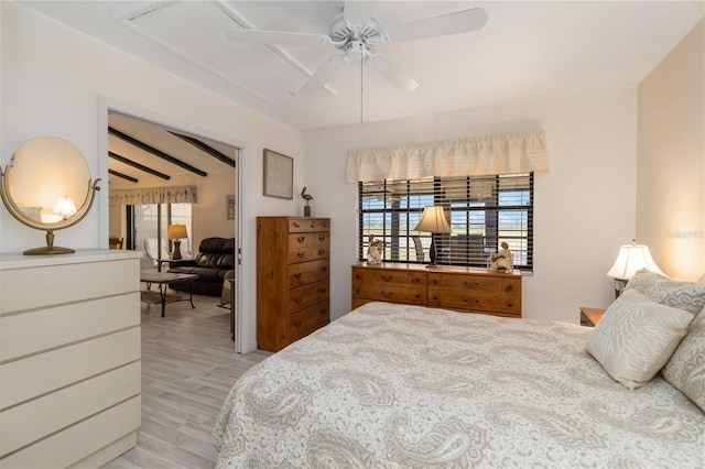 5559 Brassy Loop, North Port, FL 34287 - bedroom with multiple windows, light wood-style flooring, and a ceiling fan