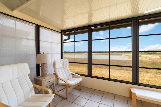 5559 Brassy Loop, North Port, FL 34287 - sunroom / solarium with a water view and tile patterned flooring