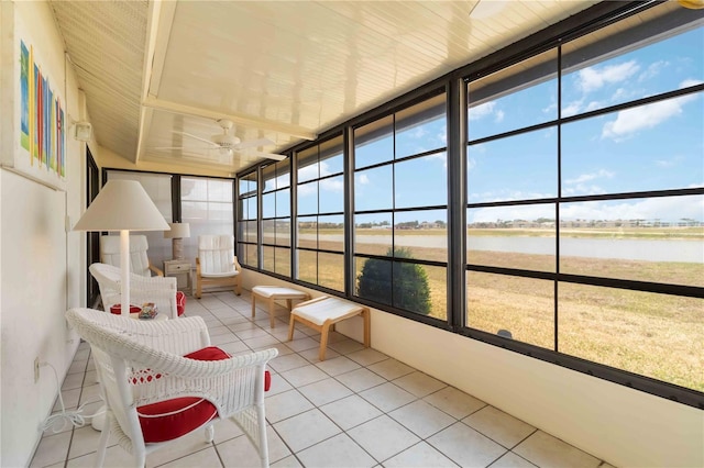 5559 Brassy Loop, North Port, FL 34287 - sunroom / solarium with a water view, tile patterned floors, a ceiling fan, and expansive windows