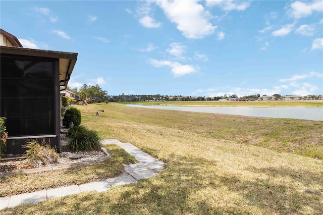 5559 Brassy Loop, North Port, FL 34287 - view of green lawn featuring a water view