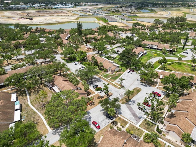 5559 Brassy Loop, North Port, FL 34287 - aerial overview of property's location with a nearby body of water and nearby suburban area