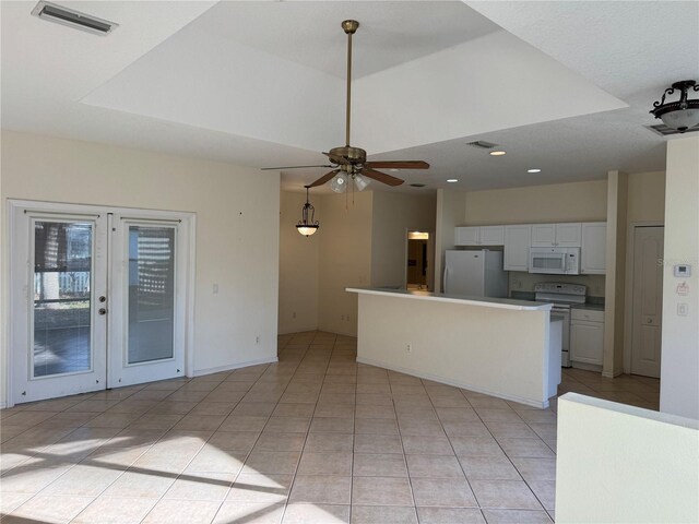 1483 Prairie Ter, North Port, FL 34286 - kitchen featuring white appliances, light tile patterned floors, ceiling fan, white cabinetry, and recessed lighting