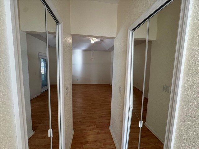 1483 Prairie Ter, North Port, FL 34286 - corridor with wood finished floors and a textured wall