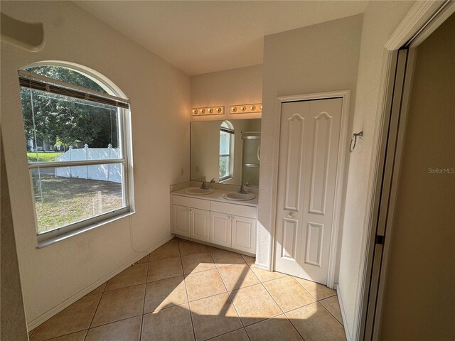 1483 Prairie Ter, North Port, FL 34286 - bathroom with plenty of natural light, tile patterned floors, and double vanity