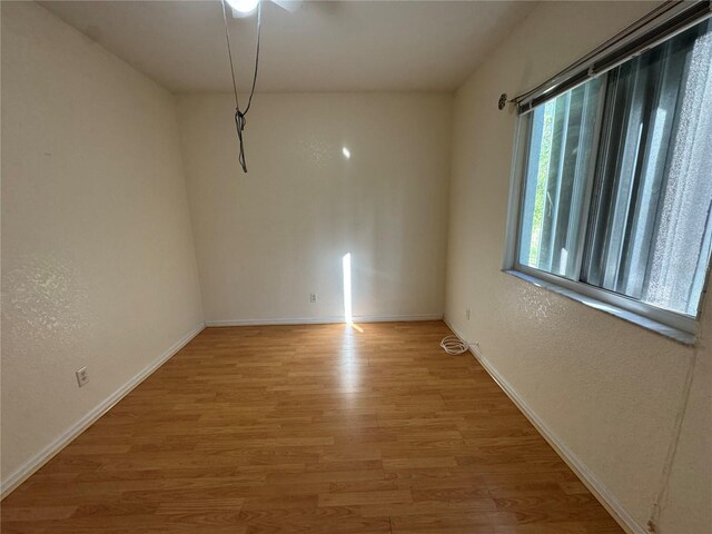 1483 Prairie Ter, North Port, FL 34286 - spare room with light wood finished floors and baseboards