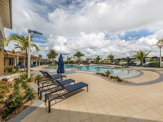 community pool featuring a patio