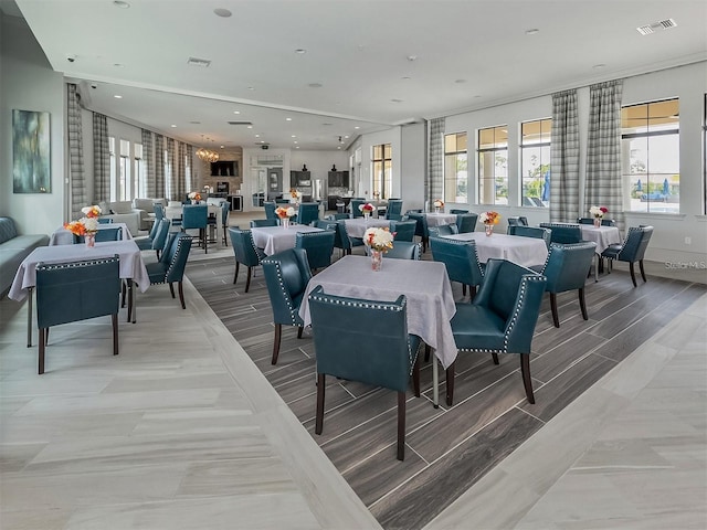 dining space with recessed lighting