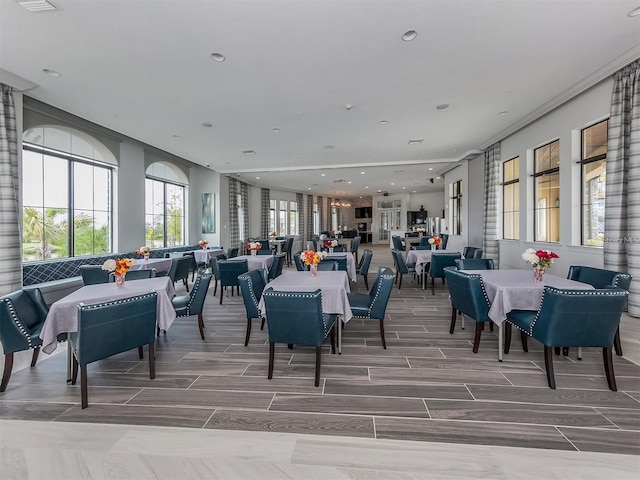 dining room with wood finish floors and recessed lighting