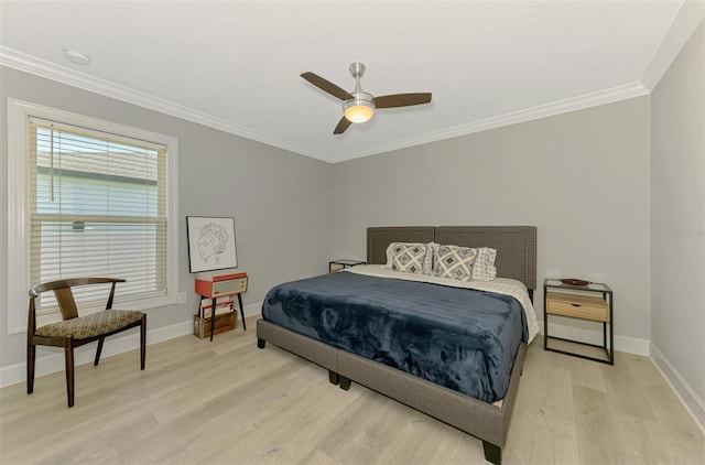 bedroom with light wood-style flooring, ornamental molding, baseboards, and ceiling fan