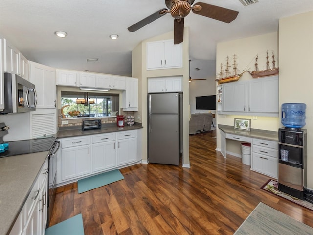 kitchen featuring a ceiling fan, dark countertops, white cabinetry, dark wood-style flooring, and appliances with stainless steel finishes
