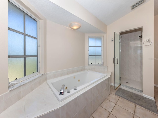 full bath featuring a stall shower, tile patterned flooring, a whirlpool tub, and visible vents