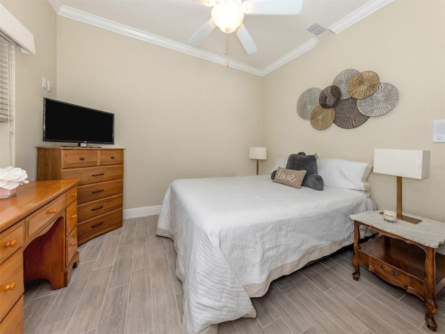 bedroom with wood tiled floor, baseboards, ceiling fan, visible vents, and crown molding