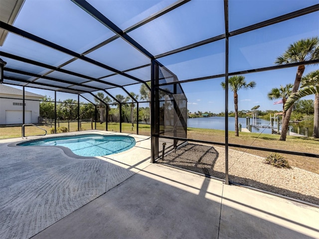 outdoor pool with a patio area, a water view, and a lanai