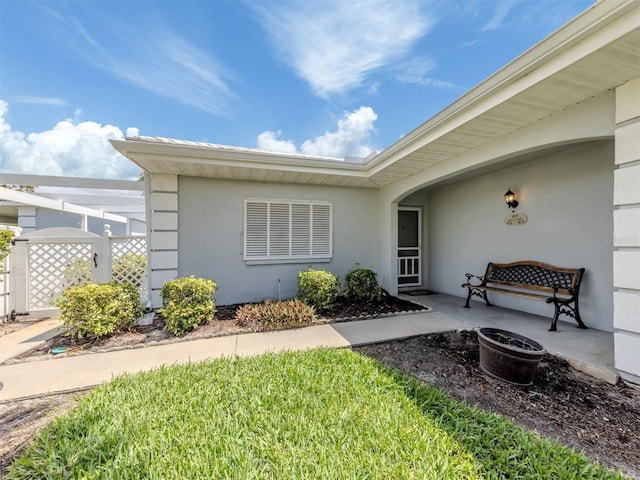 232 Cerromar Way Unit 38, Venice, FL 34293 - property entrance featuring stucco siding