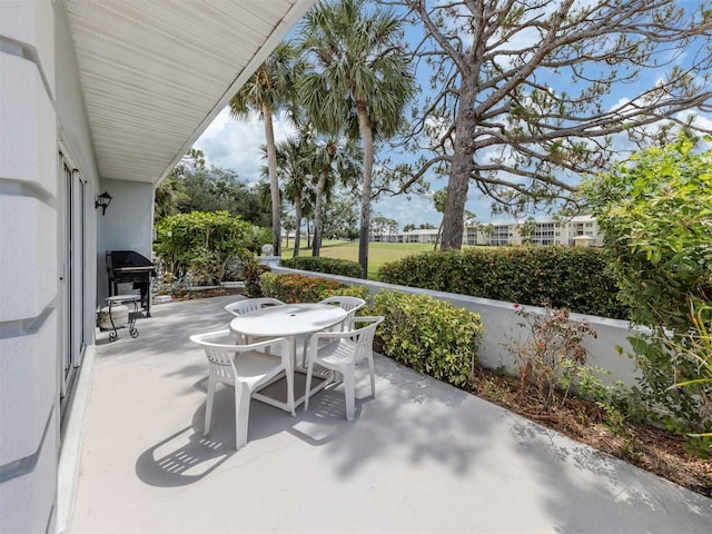 232 Cerromar Way Unit 38, Venice, FL 34293 - view of patio featuring outdoor dining area