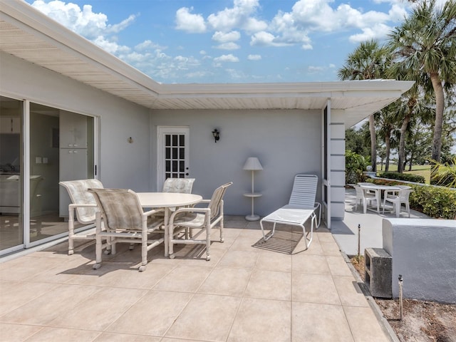 232 Cerromar Way Unit 38, Venice, FL 34293 - view of patio / terrace featuring outdoor dining area