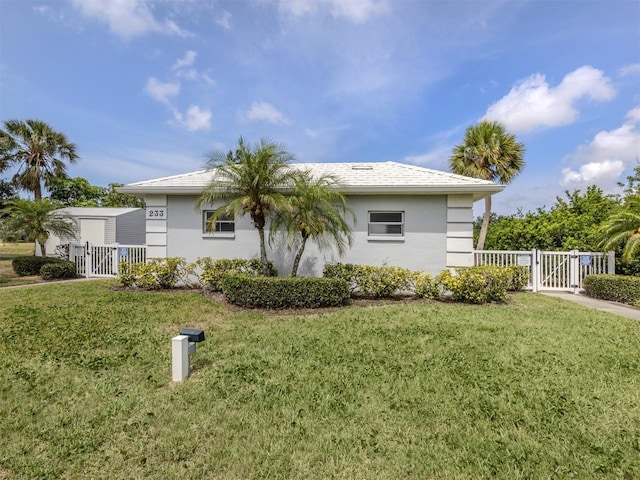 232 Cerromar Way Unit 38, Venice, FL 34293 - view of side of home with a gate and stucco siding