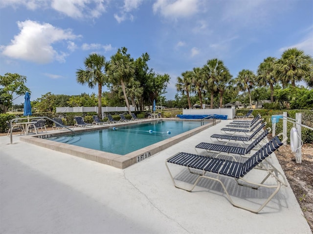 232 Cerromar Way Unit 38, Venice, FL 34293 - community pool with a patio and fence