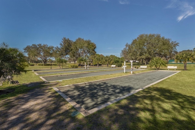 232 Cerromar Way Unit 38, Venice, FL 34293 - view of property's community featuring a game area and a lawn