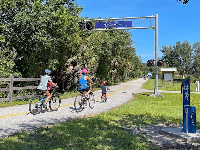 232 Cerromar Way Unit 38, Venice, FL 34293 - view of home's community with a yard and fence
