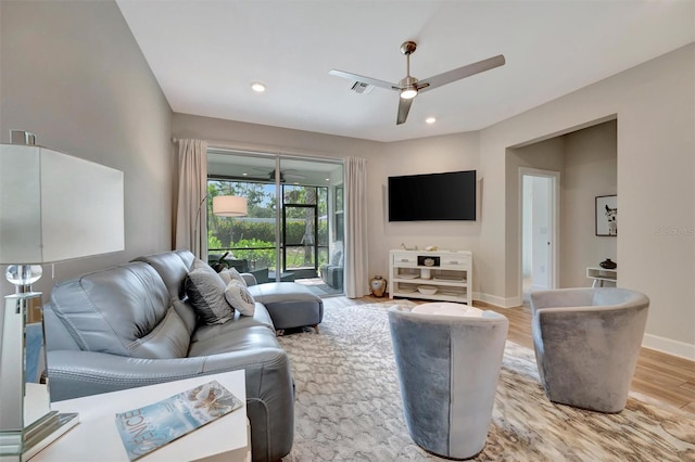 25069 Pearl Lake Cir, Englewood, FL 34223 - living room featuring a ceiling fan, baseboards, light wood-style flooring, and recessed lighting