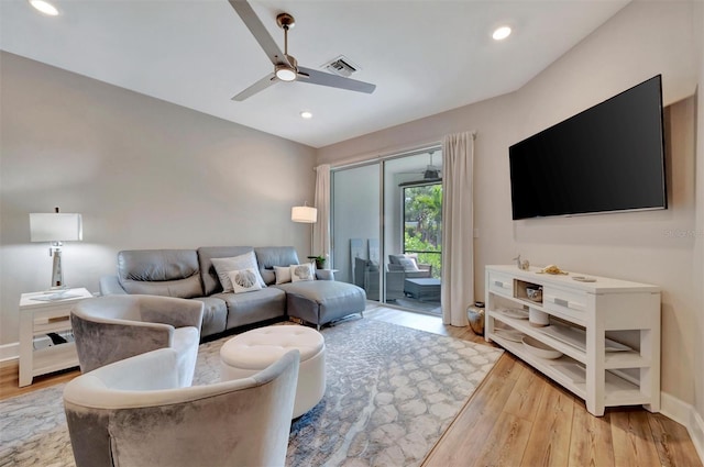 25069 Pearl Lake Cir, Englewood, FL 34223 - living area featuring light wood-style flooring, ceiling fan, baseboards, and recessed lighting