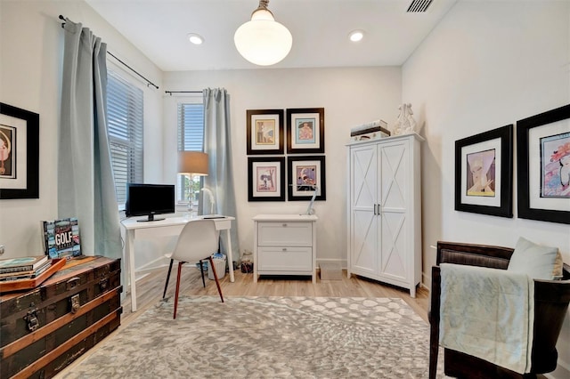 25069 Pearl Lake Cir, Englewood, FL 34223 - home office featuring light wood-type flooring and baseboards