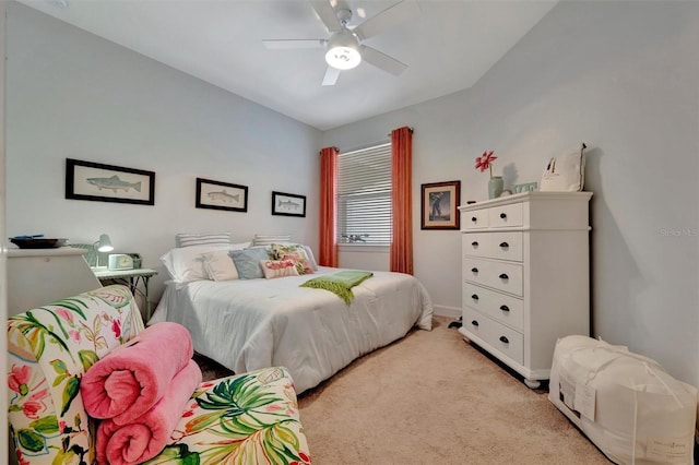 25069 Pearl Lake Cir, Englewood, FL 34223 - bedroom with light colored carpet, a ceiling fan, and baseboards