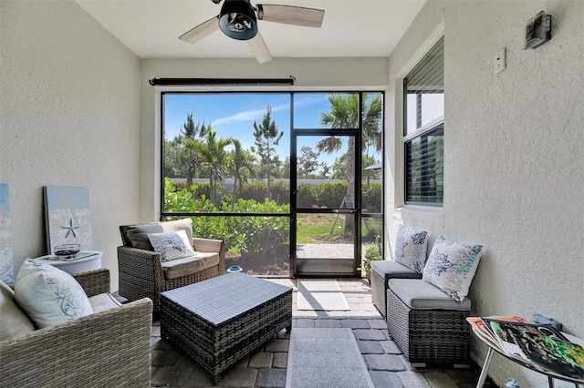 25069 Pearl Lake Cir, Englewood, FL 34223 - sunroom / solarium with a ceiling fan and an outdoor living space