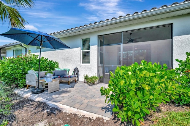 25069 Pearl Lake Cir, Englewood, FL 34223 - view of patio / terrace with outdoor lounge area and a sunroom
