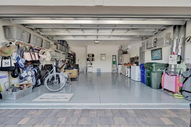 25069 Pearl Lake Cir, Englewood, FL 34223 - garage featuring a garage door opener
