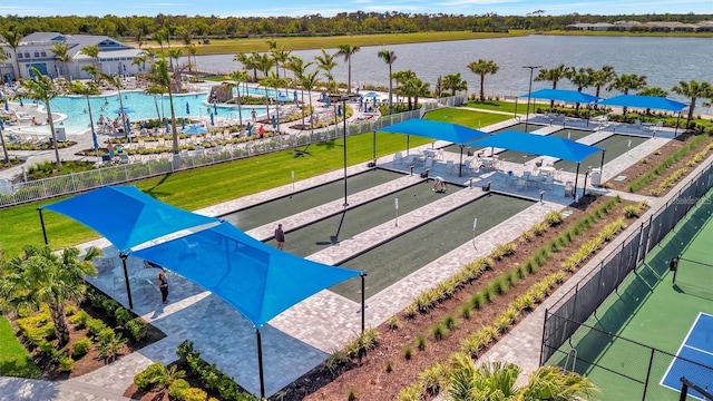 25069 Pearl Lake Cir, Englewood, FL 34223 - drone / aerial view of a pool area and a nearby body of water