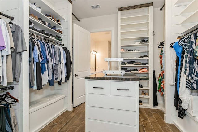 spacious closet with wood tiled floors