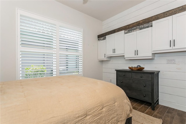 bedroom featuring wood finish floors