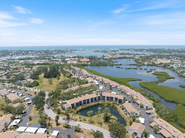 1156 Bird Bay Way Unit 104, Venice, FL 34285 - aerial view of property and surrounding area with a nearby body of water and nearby suburban area